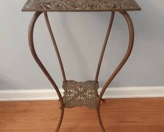 Cast iron plant stand with marble top