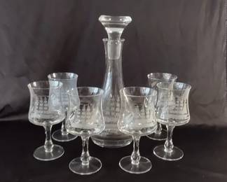 Decanter and glasses with ship etching