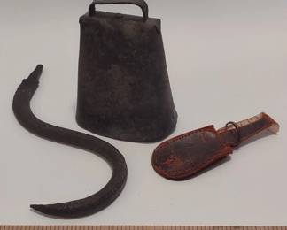 Vintage cast iron hook, cow bell and leather sheath
