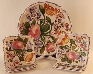 Nove hand painted flower plates from Italy