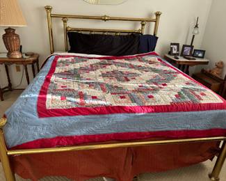 quilt     brass bed
