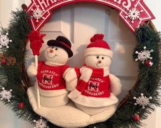 Mr. and Mrs. Snowpeople Nebraska Happy Holidays Door Sign