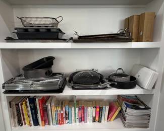 Assorted Kitchen Cookware, Books, and Storage Baskets