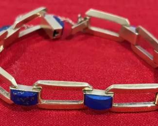 Gold colored metal  lapis like stone bracelet