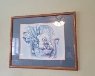 Framed Print of Two Teddy Bears in a Wicker Chair by Ava Freeman