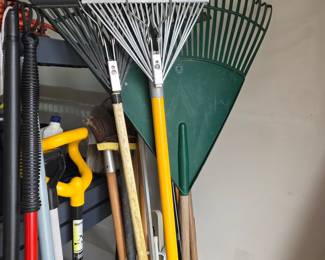 Assorted Garden Rakes and Tools with Branded Items