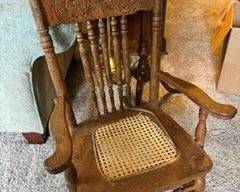 Antique Oak Pressed Back Rocking Chair with Cane Seat