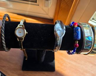 Assorted Women's Bracelets and Watches including Timex, Geneva, and Abalone Cuff