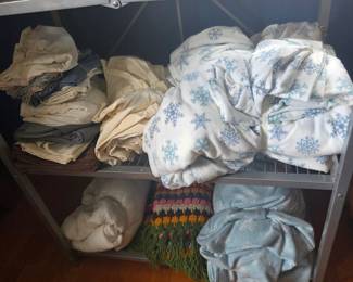 Assorted Bedding and Blankets with Snowflake and Geometric Patterns