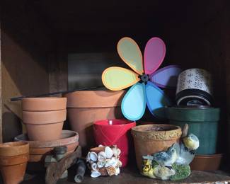 Assorted Garden Pots, Decorative Planter, and Pinwheel Spinner