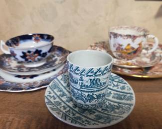 Antique Porcelain Tea Cup and Saucer Set with Viking Ship and Floral Patterns