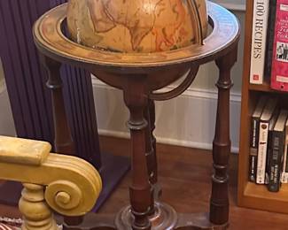 Metal globe with wooden stand
