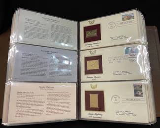 Collection of Golden Replicas of United States Stamps