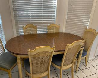 Informal Expanding Dining Table with 6 Cane Back Chairs