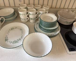 Corelle dinnerware with additional casseroles and serving pieces