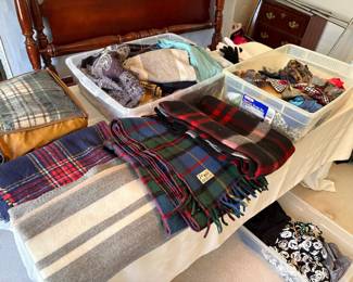 blankets, throws and bins of scarves