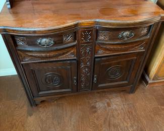 antique mirror-backed sideboard