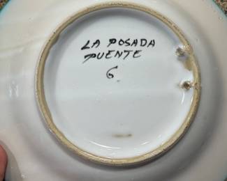 collectible plates are hand-painted ceramic ware from Spain