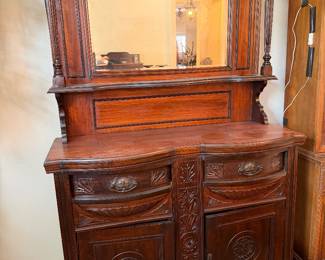 antique mirror-backed sideboard
