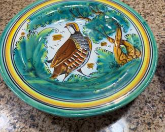 collectible plates are hand-painted ceramic ware from Spain