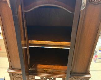 antique floor-model radio cabinet manufactured by Stromberg-Carlson 1920’s