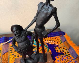 vintage Spanish figurine depicting Don Quixote and Sancho Panza
