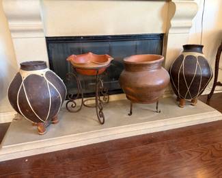 collection of rustic, decorative clay vessels, specifically traditional Mexican folk art pottery
