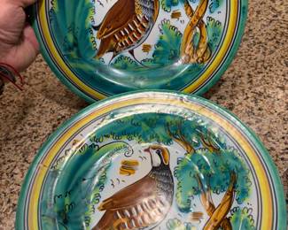 collectible plates are hand-painted ceramic ware from Spain