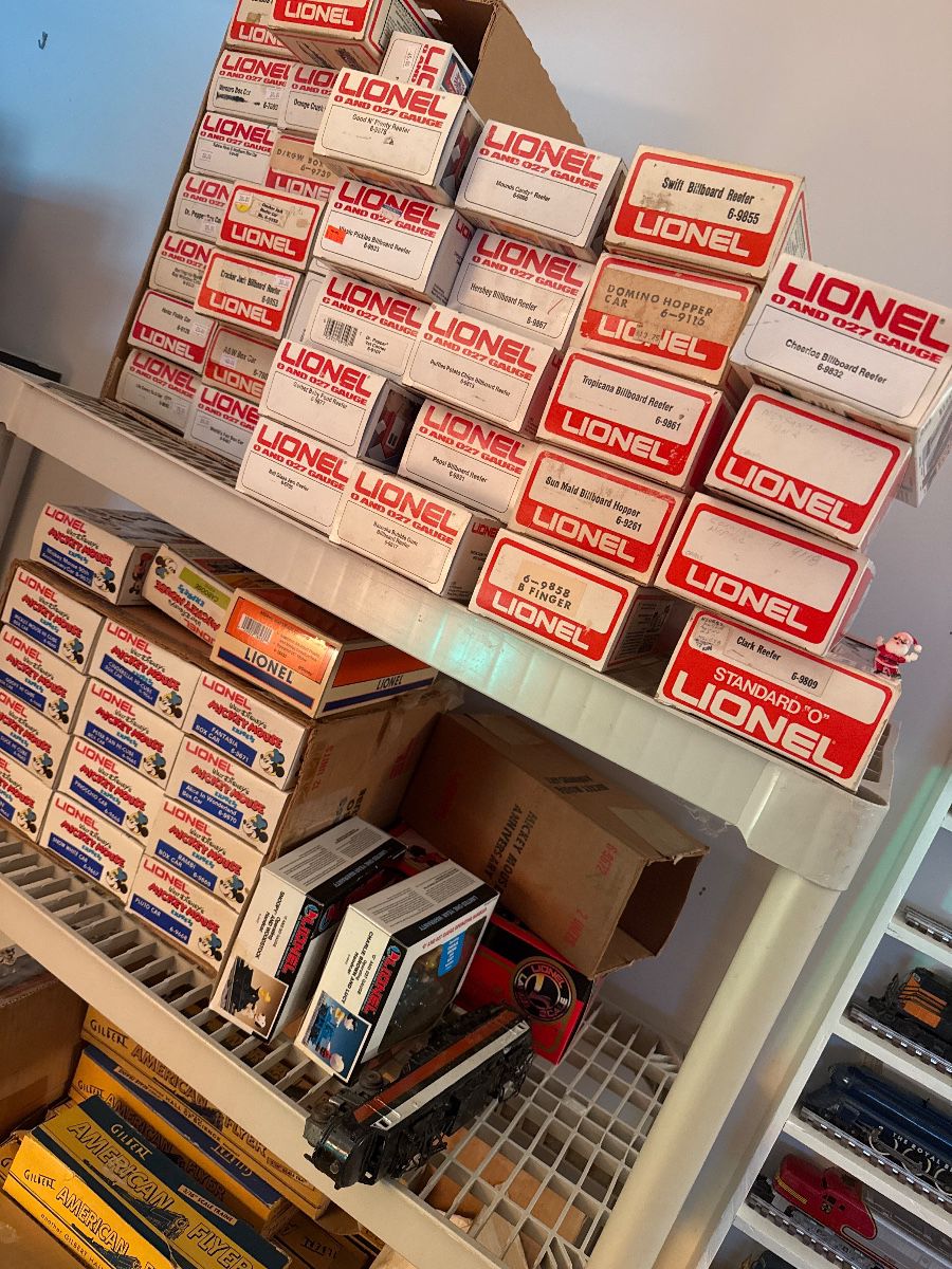 Lots of trains in their original boxes