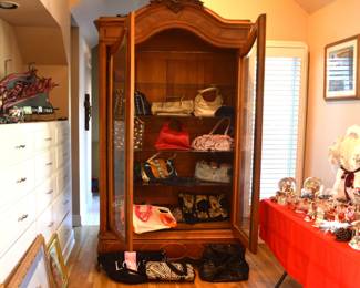 Purses in armoire