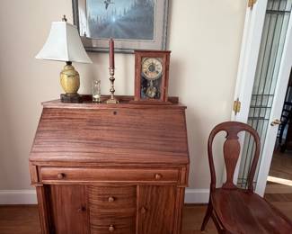 This antique secretary GLOWS! The wood grain is beautiful 
