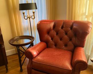 Oversized red tufted wingback recliner that looks VERY Ralph Lauren-ish (google search it)