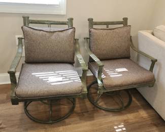 Two swivel outdoor chairs
