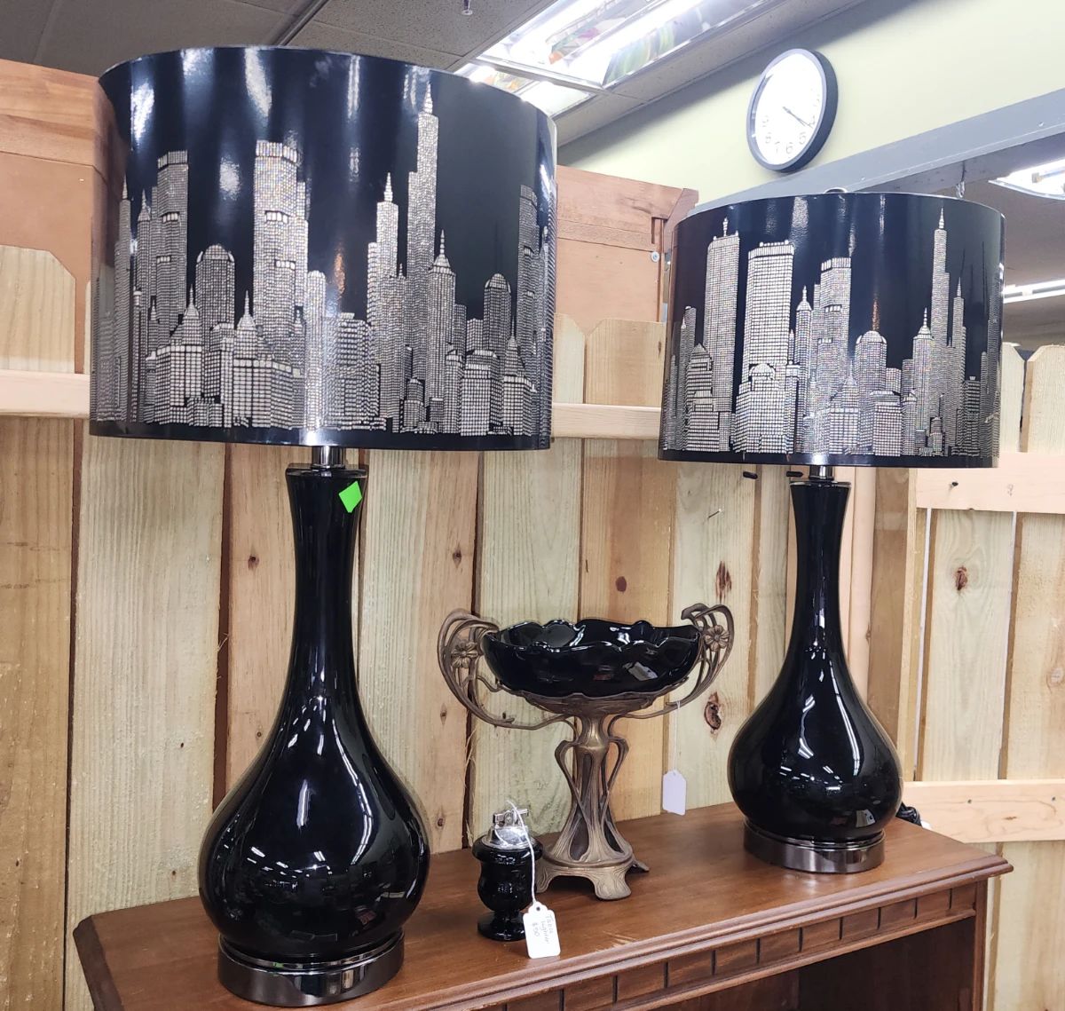 Pair of lamps with metal cityscape shades