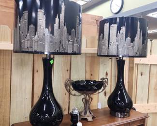 Pair of lamps with metal cityscape shades