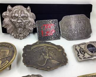 8 vtg. Belt buckles. NRA, NFL, Bambu, Railroad, lion. Great selection. Wells Fargo buckle is missing fastener hardware on back