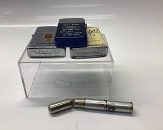 4 ADVERTISING LIGHTERS FORD MOTOR CO. CHESTERFIELD CIGARETTES, VICTORY CIGARETTES AND STAR GARAGE CHRYSLER