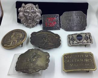 8 vtg. Belt buckles. NRA, NFL, Bambu, Railroad, lion. Great selection. Wells Fargo buckle is missing fastener hardware on back
