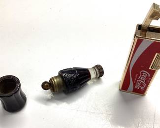 2) VINTAGE COCA COLA LIGHTERS Manufactured in the 1950s and 1960s