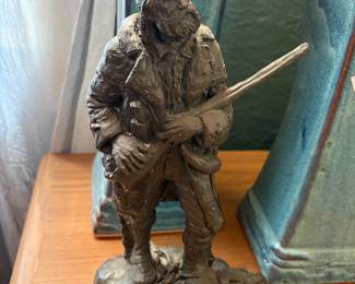 Michael Garman statue signed