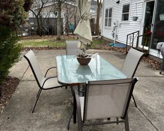 Patio table, chairs and umbrella