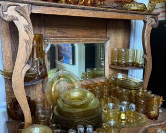 Lovely antique buffet with amber glass