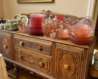 Gorgeous antique buffet filled with pink glass and china