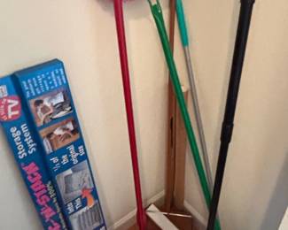 Variety of mops and cleaning accessories