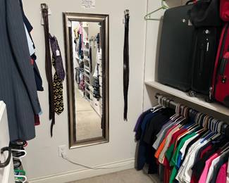 Closet with men and women clothing ,luggage