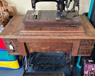 Vintage sewing machine with case