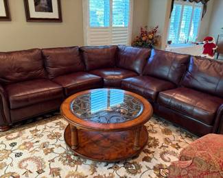 Leather sectional, round coffee table