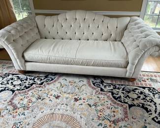 Stylish tufted scroll arm sofa