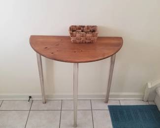 Demilune foyer table