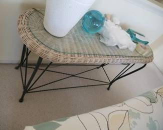 Wicker foyer table with glass top & wrought iron base 